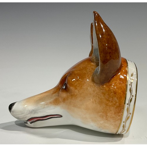 146 - A Samson Hancock stirrup cup as a red foxes mask, naturalistically painted, the collar in gilt inscr... 