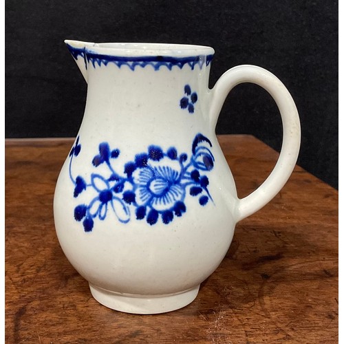 175 - A Liverpool sparrow beak jug, painted in under glaze blue with stylised flowers, crows foot border, ... 