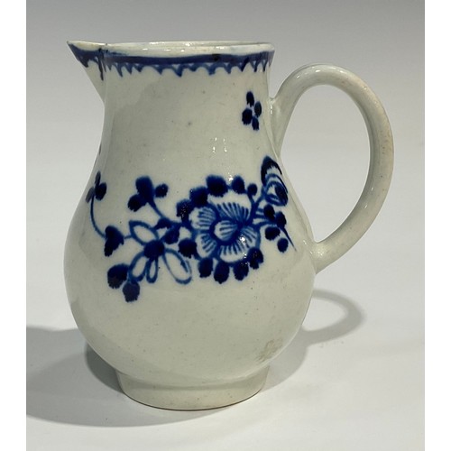 175 - A Liverpool sparrow beak jug, painted in under glaze blue with stylised flowers, crows foot border, ... 