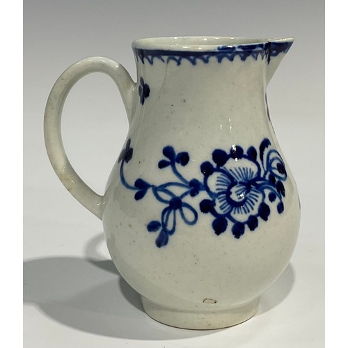 175 - A Liverpool sparrow beak jug, painted in under glaze blue with stylised flowers, crows foot border, ... 