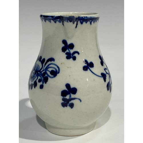 175 - A Liverpool sparrow beak jug, painted in under glaze blue with stylised flowers, crows foot border, ... 