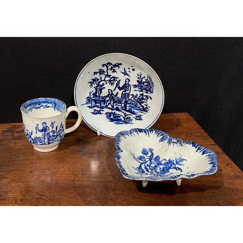 174 - A Liverpool coffee cup and saucer, painted in underglaze blue with a Chinoiserie landscape and figur... 