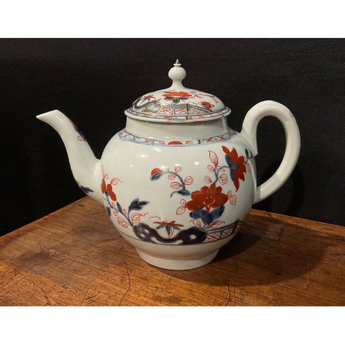 176 - A rare Liverpool Imari globular teapot and cover, decorated in underglaze blue and overglaze red, pi... 