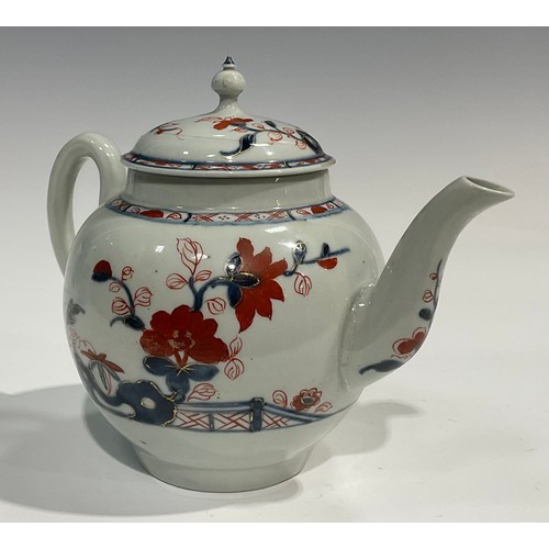 176 - A rare Liverpool Imari globular teapot and cover, decorated in underglaze blue and overglaze red, pi... 