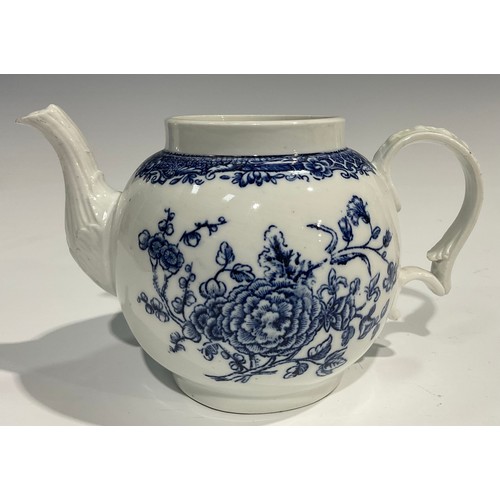 133 - A rare Bristol blue and white transfer printed globular teapot decorated with a spray of flowers und... 