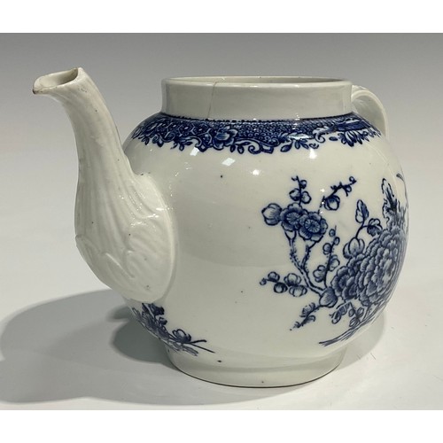 133 - A rare Bristol blue and white transfer printed globular teapot decorated with a spray of flowers und... 