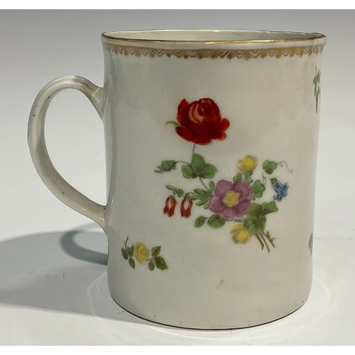 132 - A Plymouth mug, finely painted with a bouquet of flowers and flower sprays, under a gilt border, rib... 