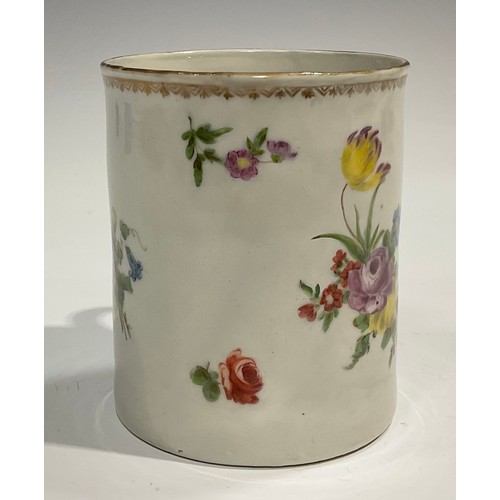 132 - A Plymouth mug, finely painted with a bouquet of flowers and flower sprays, under a gilt border, rib... 