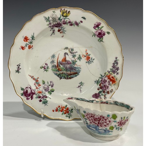 118 - A Chelsea shaped circular plate, painted with fanciful birds surrounded with scattered floral sprigs... 