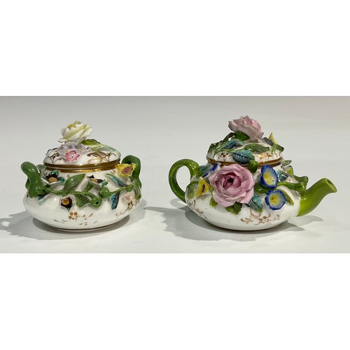 160 - An English porcelain miniature teapot and sucrier, probably Minton, both encrusted with colourful fl... 