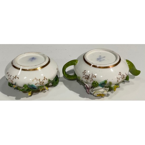 160 - An English porcelain miniature teapot and sucrier, probably Minton, both encrusted with colourful fl... 