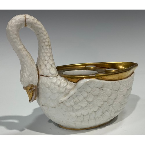 157 - An English porcelain inkstand in the shape of a basket of naturalistic form, with two removable inkw... 