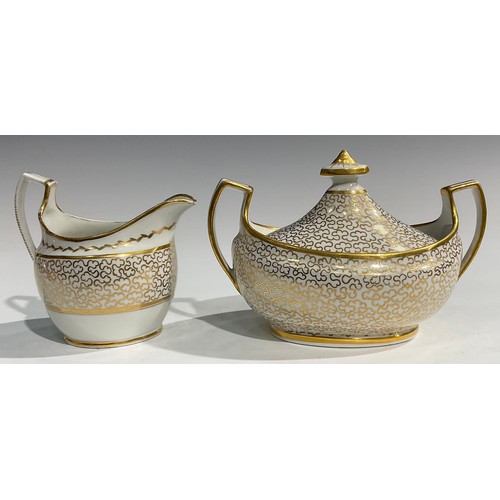 115 - A Chamberlains Worcester vermicular gilded part tea service comprising sucrier and cover, cream jug,... 