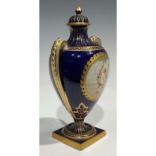 128 - A Minton two handled pedestal vase and cover, strongly attributed to Antonin Boullemier, decorated w... 