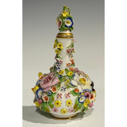 240 - A Derby porcelain scent bottle and stopper, encrusted with colourful flowers, crown and D mark in re... 