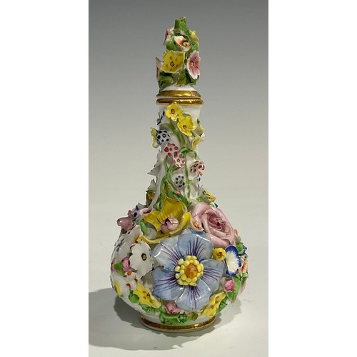 240 - A Derby porcelain scent bottle and stopper, encrusted with colourful flowers, crown and D mark in re... 