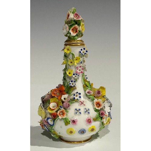 240 - A Derby porcelain scent bottle and stopper, encrusted with colourful flowers, crown and D mark in re... 