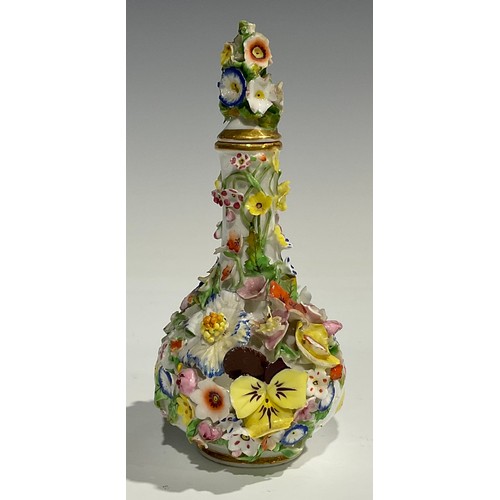 240 - A Derby porcelain scent bottle and stopper, encrusted with colourful flowers, crown and D mark in re... 