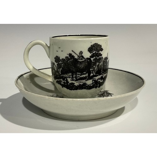 213 - A Worcester Milkmaids and Cow Herder pattern coffee cup and saucer, printed in monochrome after Robe... 