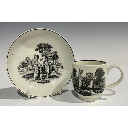 213 - A Worcester Milkmaids and Cow Herder pattern coffee cup and saucer, printed in monochrome after Robe... 