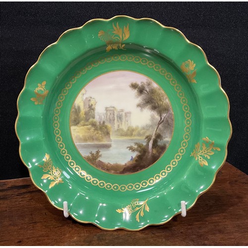 199 - A Royal Worcester Named View wavy edged circular dish, painted by George Johnson, Ragland Castle, on... 