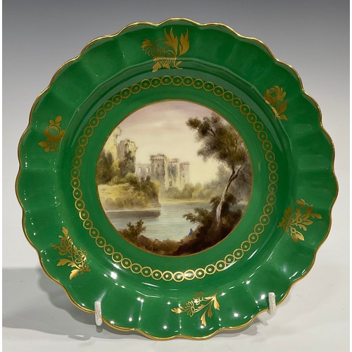 199 - A Royal Worcester Named View wavy edged circular dish, painted by George Johnson, Ragland Castle, on... 