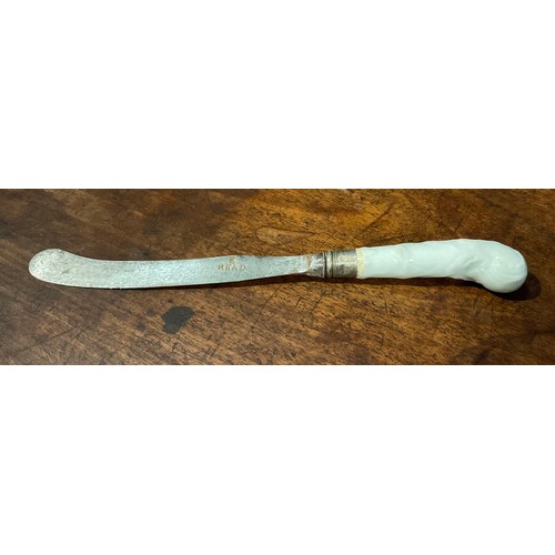 188 - A rare Worcester Blanc de Chine knife handle, pistol grip, moulded with scrolls, the steel blade sta... 