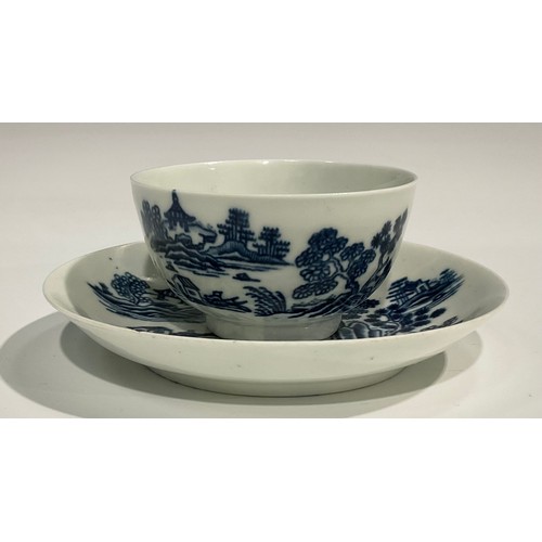 228 - A Worcester The Man in the Pavilion pattern tea bowl and saucer, printed with pagoda, trees, and roc... 