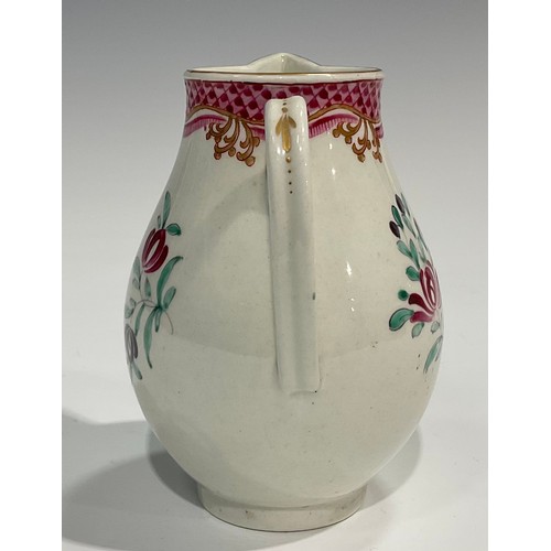 206 - A Worcester Famille Rose sparrow beak jug, scale pink border, scroll handle, 10cm high, c.1770