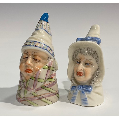 191 - A Royal Worcester candlesnuffer, Mr Caudle, wearing a night cap and blanket, lightly coloured, 8cm h... 