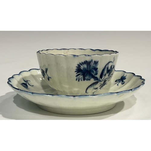 209 - A Worcester fluted Gilliflower pattern tea bowl and saucer, crescent mark, c.1770