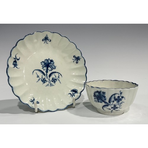 209 - A Worcester fluted Gilliflower pattern tea bowl and saucer, crescent mark, c.1770