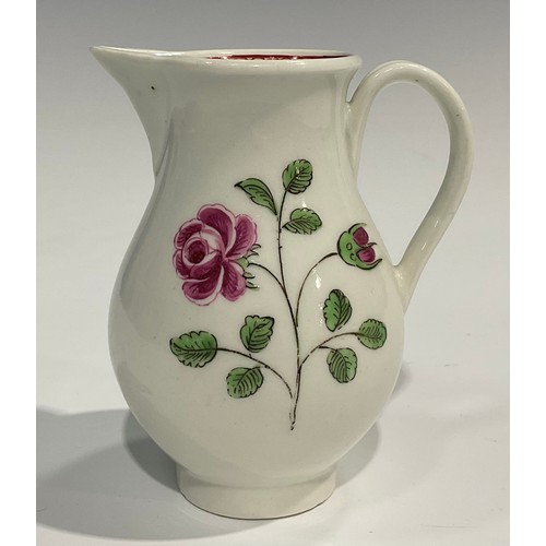 227 - A Worcester sparrow beak jug, painted with roses and rose buds, the interior with crows foot border,... 