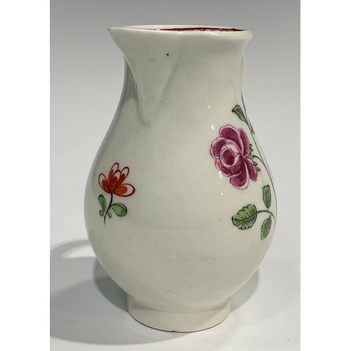 227 - A Worcester sparrow beak jug, painted with roses and rose buds, the interior with crows foot border,... 