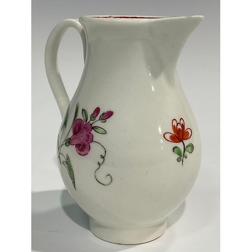 227 - A Worcester sparrow beak jug, painted with roses and rose buds, the interior with crows foot border,... 