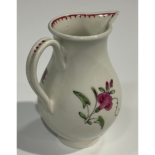 227 - A Worcester sparrow beak jug, painted with roses and rose buds, the interior with crows foot border,... 