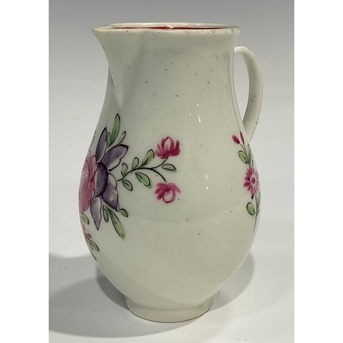 226 - A Worcester sparrow beak jug, painted with flowers, internal pink diaper border, ribbed loop handle,... 