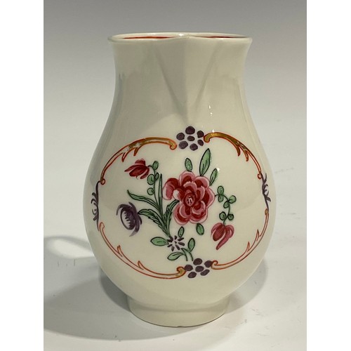 224 - A Worcester sparrow beak jug, painted in Chinese export style with flowers in an oval panel, further... 