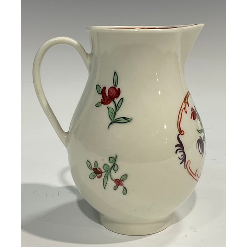 224 - A Worcester sparrow beak jug, painted in Chinese export style with flowers in an oval panel, further... 