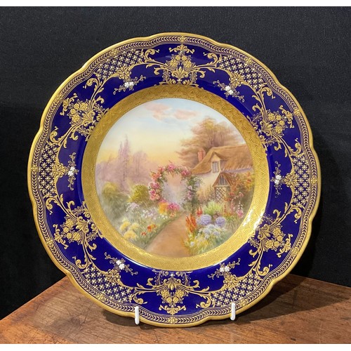 201 - A Royal Worcester shaped circular cabinet plate, painted by R. Rushton, signed, the field with Engli... 