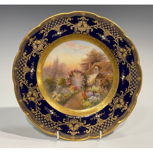 201 - A Royal Worcester shaped circular cabinet plate, painted by R. Rushton, signed, the field with Engli... 