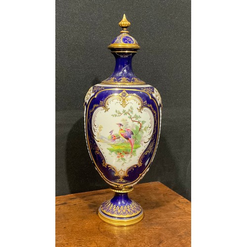 200 - A Royal Worcester ovoid pedestal vase and cover, in the manner of George Johnson, painted with a car... 