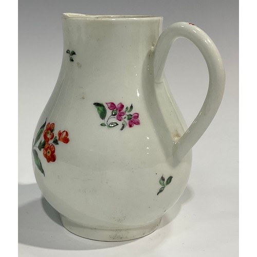 225 - A Worcester sparrow beak jug, painted with a floral bouquet and other scattered flowers, 10.5cm high... 