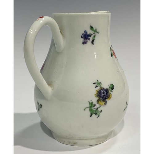 225 - A Worcester sparrow beak jug, painted with a floral bouquet and other scattered flowers, 10.5cm high... 