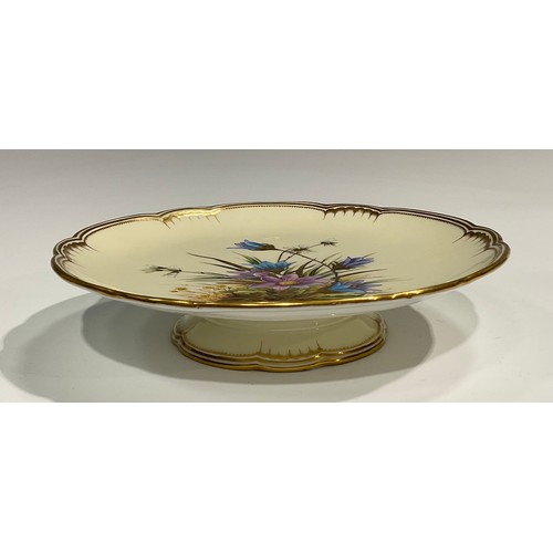 265 - A Royal Crown Derby shaped circular comport, painted with flowers on a cream ground, the leaves and ... 