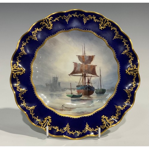 266 - A Royal Crown Derby wavy edged cabinet plate, painted by W. E. J. Dean, signed, the field painted wi... 