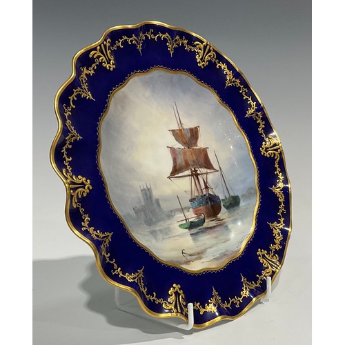 266 - A Royal Crown Derby wavy edged cabinet plate, painted by W. E. J. Dean, signed, the field painted wi... 