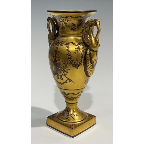 284 - A 19th century Paris porcelain two handled pedestal vase, painted en-grisaille with musical trophies... 