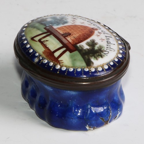 2237 - A George III Bilston enamel oval patch box, the cover decorated with a bee hive within a pearled bor... 