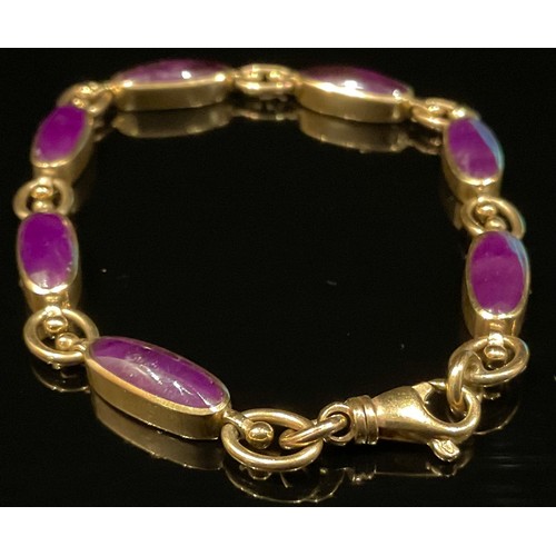 1333 - A 9ct gold panel bracelet, each oval link set with amethyst, quite plain, divided by oval hoops, 20.... 